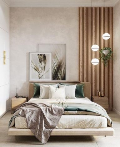 Chambre moderne avec lit élégant, décoration naturelle et mur en bois.