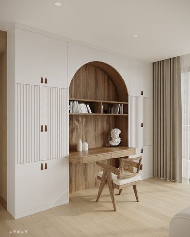 Espace de travail avec un bureau en bois et un meuble rangement blanc, décor épuré.