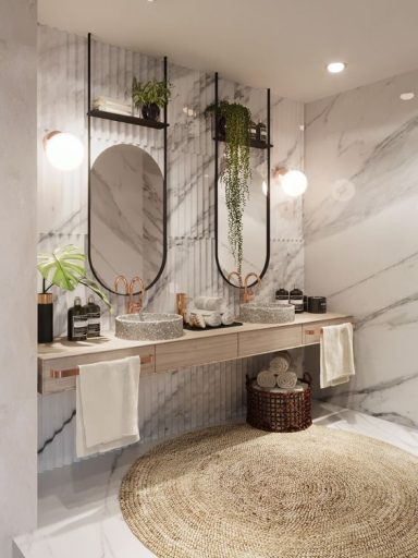 Salle de bain moderne avec double vasque, miroirs ovales et plantes décoratives.