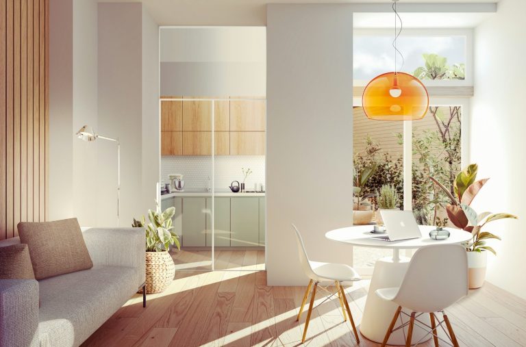 Intérieur moderne avec salon, cuisine ouverte et luminaires lumineux.